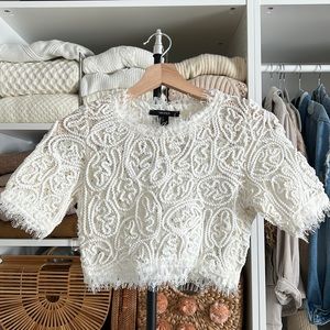 Cute crop top with pretty details. New with tag